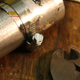 Image for article titled How To Fix Your Exhaust With An Empty Beer Can